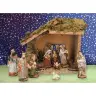 Crèche de Noël : cabane + 11 personnages de 9 cm (28 x 15 x 21 cm)