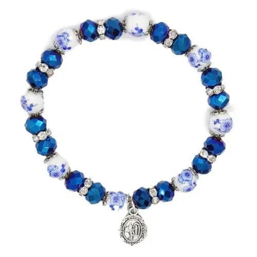 Bracelet sur élastique ave cristaux bleu et médaille de N.D de Lourdes