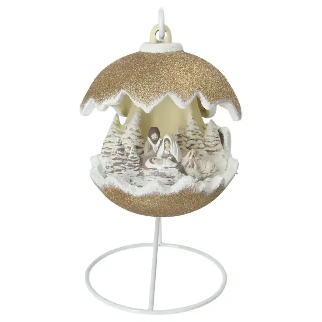 Christmas nativity in a ceramic christmasball + light