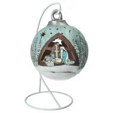 Christmas nativity in a blue-tinted ceramics christmasball + light