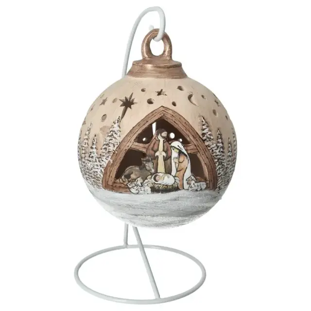 Christmas nativity in a sepia-tinted ceramics christmasball + light