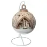 Christmas nativity in a sepia-tinted ceramics christmasball + light