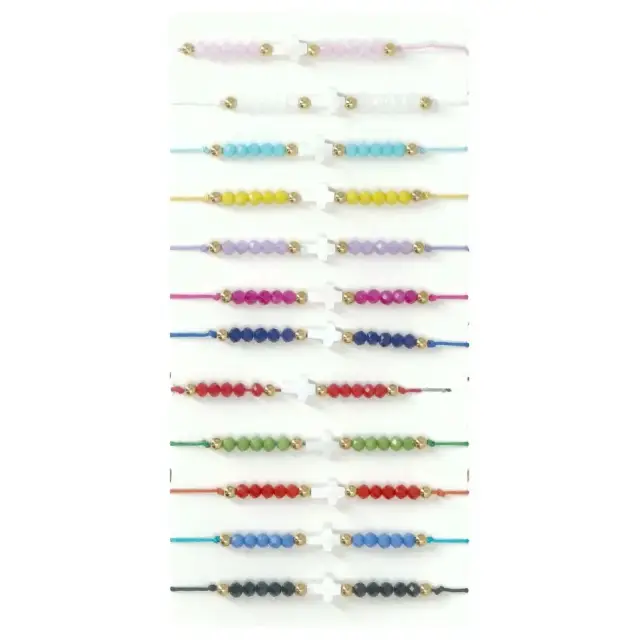 Armband met parelmoer kruis