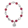 Bracelet sur élastique avec grains rouges et coeur + médaille