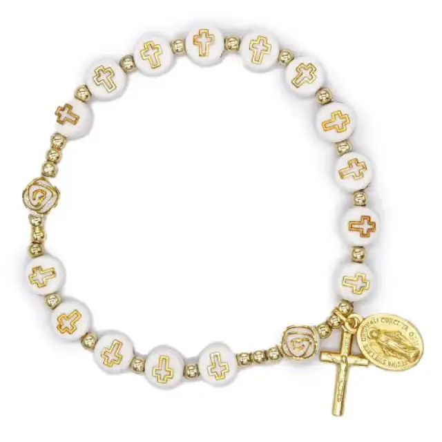 Elastic bracelet with white beads with cross and gold detailing + medallion and cross